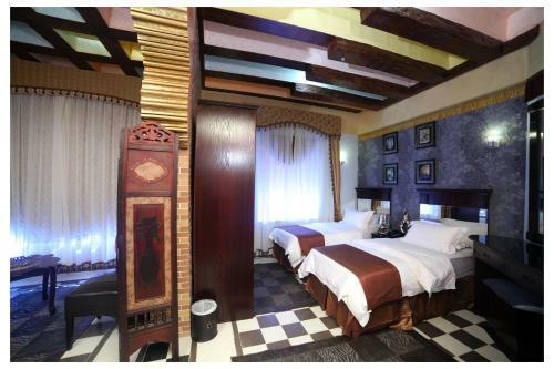Apartamento Roomi Suites Hotel