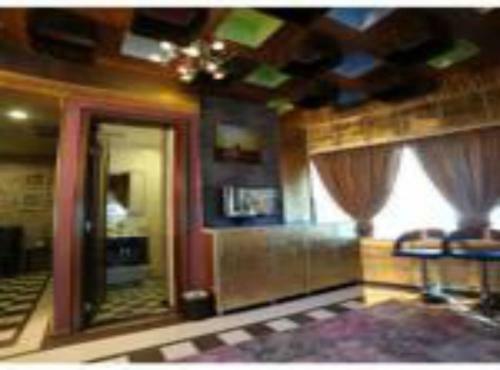 Apartamento Roomi Suites Hotel