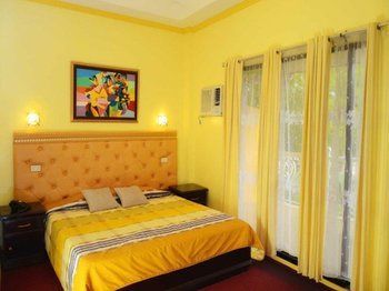 Sunny Point Hotel & Apartelle