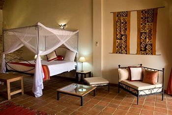 Le Petit Village Hotel