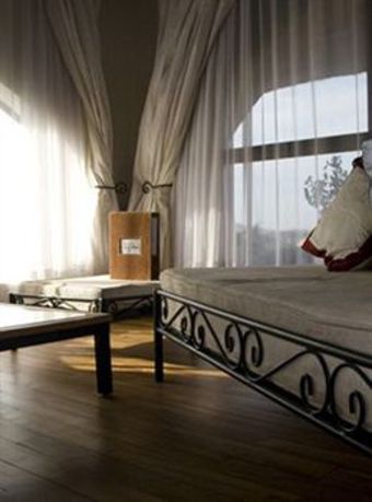 Le Petit Village Hotel