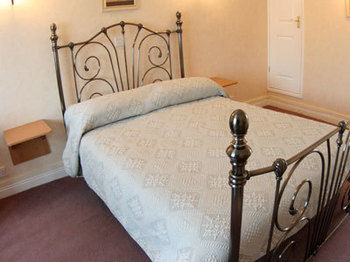 Hostal The Town And Country Lodge