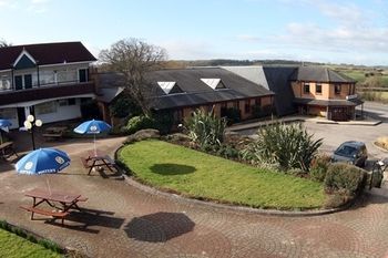Hostal The Town And Country Lodge