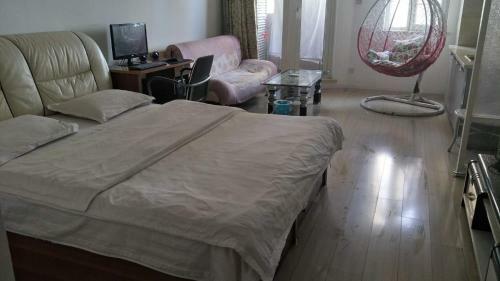 Panjin Xinyuan Aparthotel