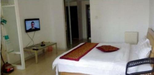 Panjin Xinyuan Aparthotel