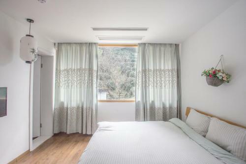 Hangzhou Luchai Inn Cartoon House