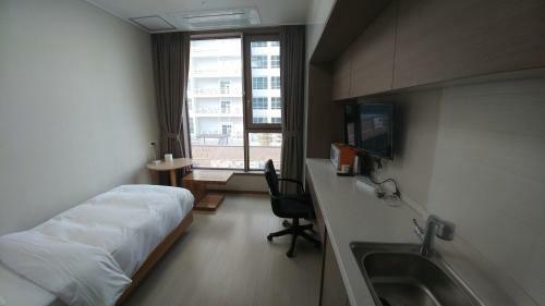 Apartamento Cplus Residence Hotel