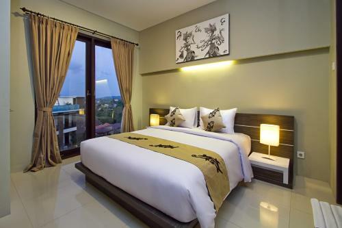 Hotel Denbukit Residence And Suite