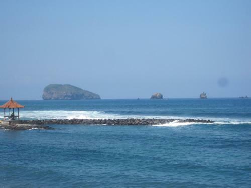 Hostal Segara Wangi Beach Cottages