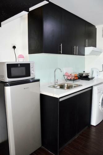 Apartamento Taragon Residences