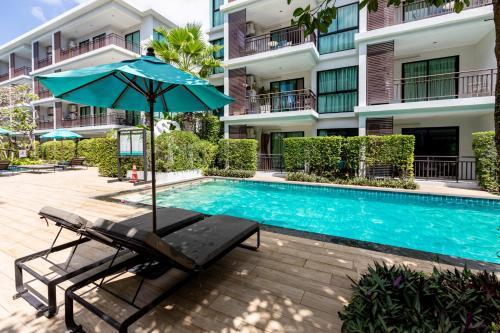 Apartamentos The Title Beach Front
