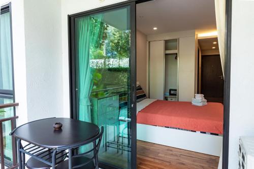 Apartamentos The Title Beach Front
