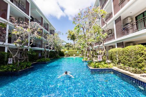 Apartamentos The Title Beach Front