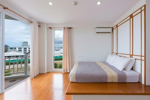 Apartamentos Baan Poolom Beachfront Condominium