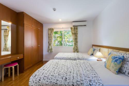 Apartamentos Baan Poolom Beachfront Condominium