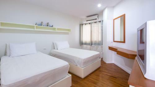 Apartamentos Baan Poolom Beachfront Condominium