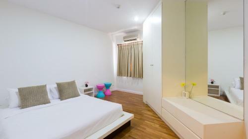 Apartamentos Baan Poolom Beachfront Condominium