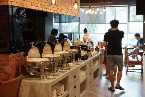 Aparthotel The Sunreno Serviced Apartment