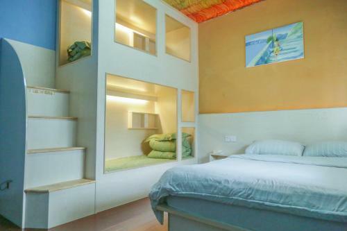 Xidi Kunlun International Hostel
