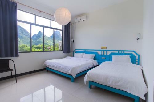 Bed & Breakfast Dragon's Den Hostel In Yangshuo