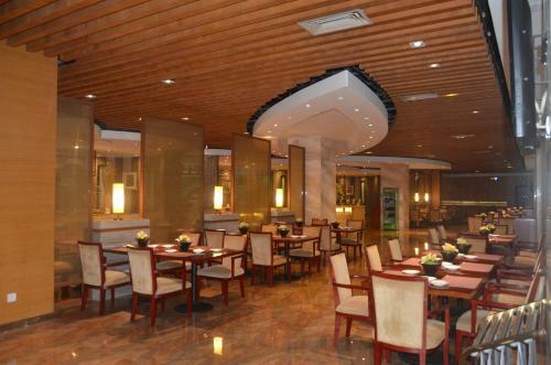 E Mei Shan Central Sunshine Shangsai Hotel