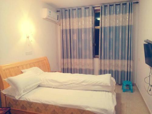 Posada Wuyuan Ancient Well Yayuan Inn