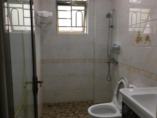 Apartamento Shuangyuewan Happy Inn