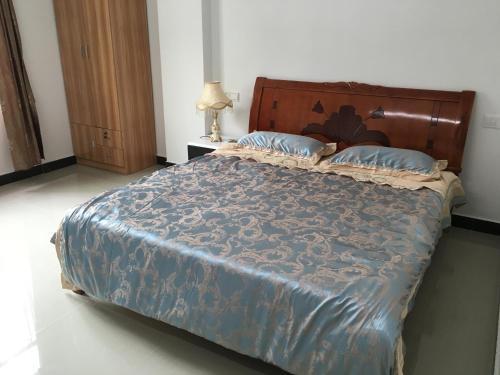 Apartamento Shuangyuewan Happy Inn