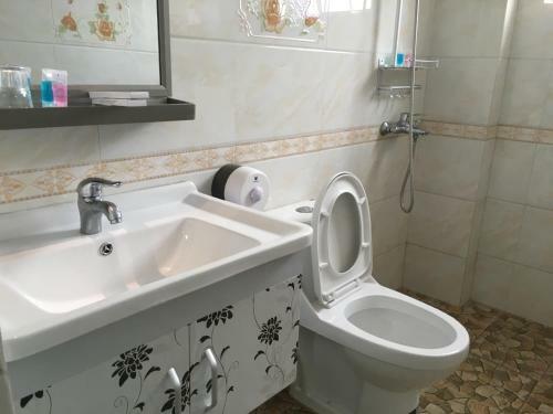 Apartamento Shuangyuewan Happy Inn