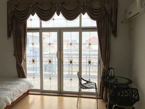 Apartamento Shuangyuewan Happy Inn