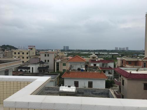 Apartamento Shuangyuewan Happy Inn