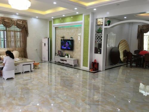 Apartamento Shuangyuewan Happy Inn