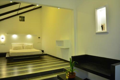 Posada Midigama Holiday Inn