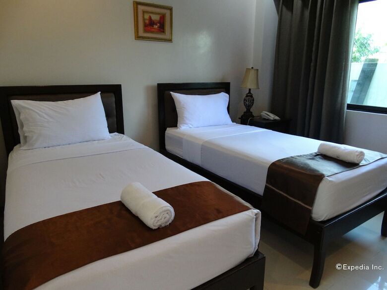 Hotel The Peridot Suites
