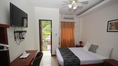 Posada El Nido Royal Palm Inn