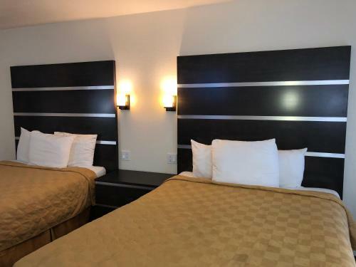 Motel Cedar Inn & Suites
