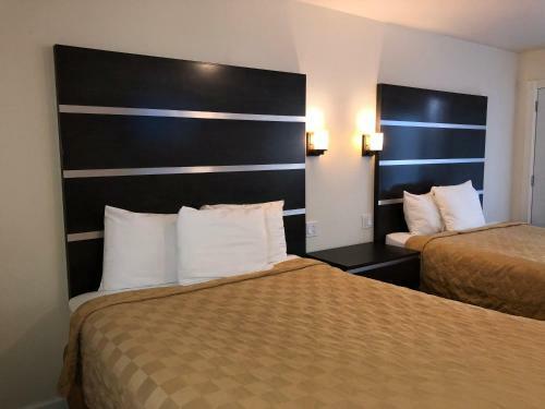 Motel Cedar Inn & Suites