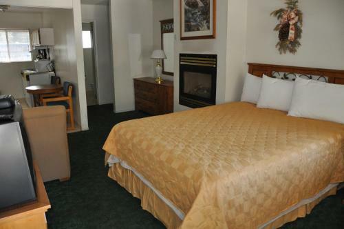 Motel Cedar Inn & Suites