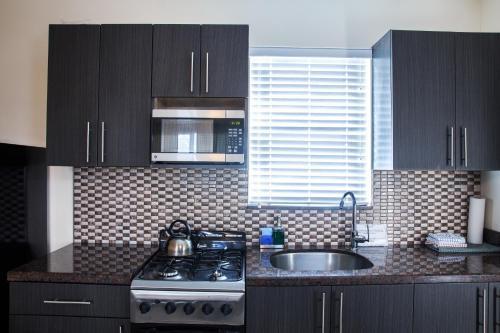 Posada Caribbean Suites Grandby Motel