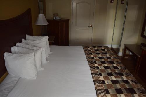 Motel Atkinson Inn & Suites
