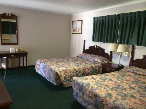 Motel Rapids Inn & Suites