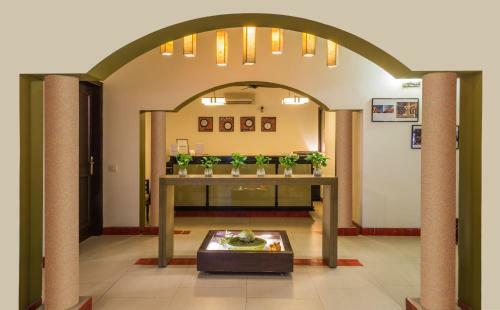 Hotel Home@f37 Kailash Colony Metro