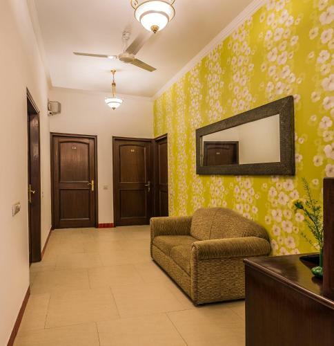 Hotel Home@f37 Kailash Colony Metro