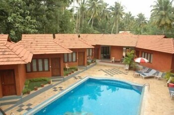 Hostal Cliff Garden Beach Resort