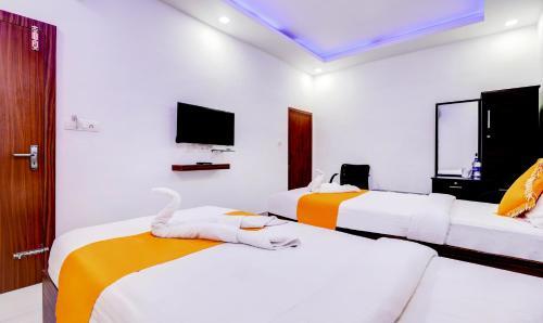 Hostal Adathara Auditorium Ap Residency