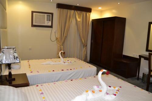 Apartamento Makarm Palm Hotel Suites