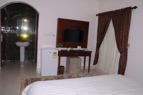 Apartamento Makarm Palm Hotel Suites