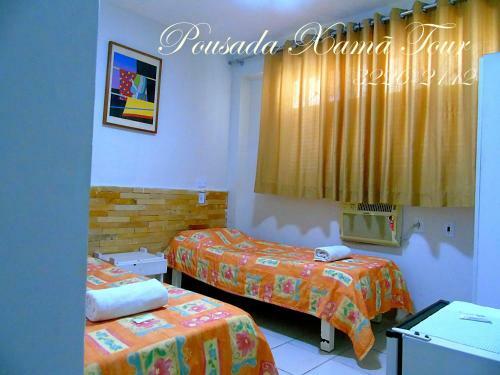 Hostal Pousada Xam� Tour