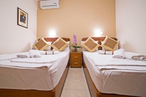 Apartamento Pioneer Excelsior Rooms