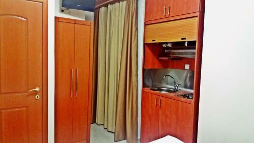 Apartamento Pioneer Excelsior Rooms
